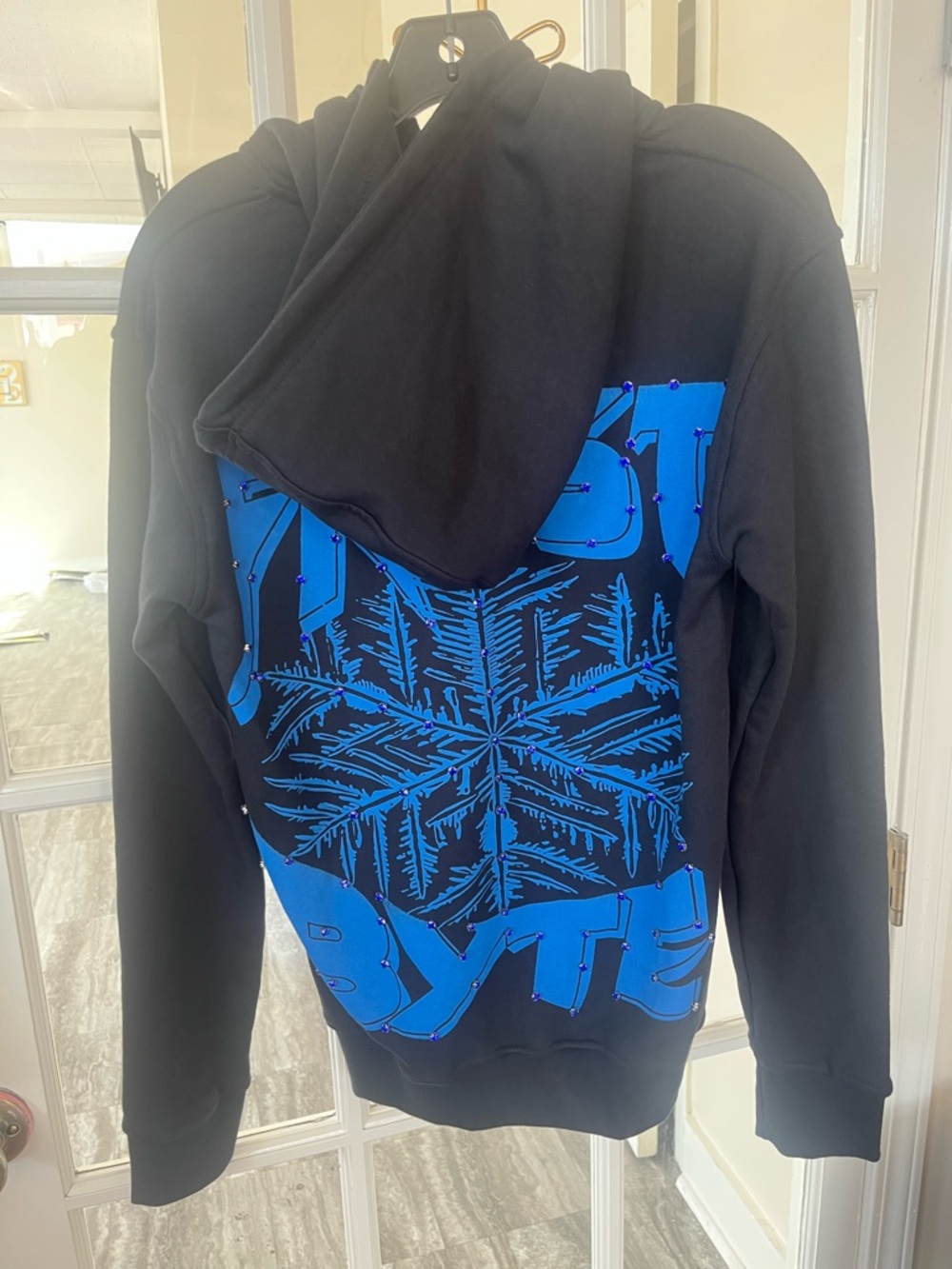 Vintage Black Zip-Up Hoodie with Bright Blue Snowflake Graphic